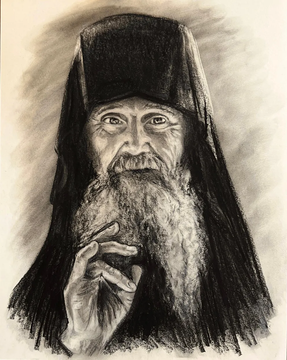 Charcoal portrait of Elder Ephraim of Arizona, warm chiaroscuro on paper, by Clare Elise Lucia.