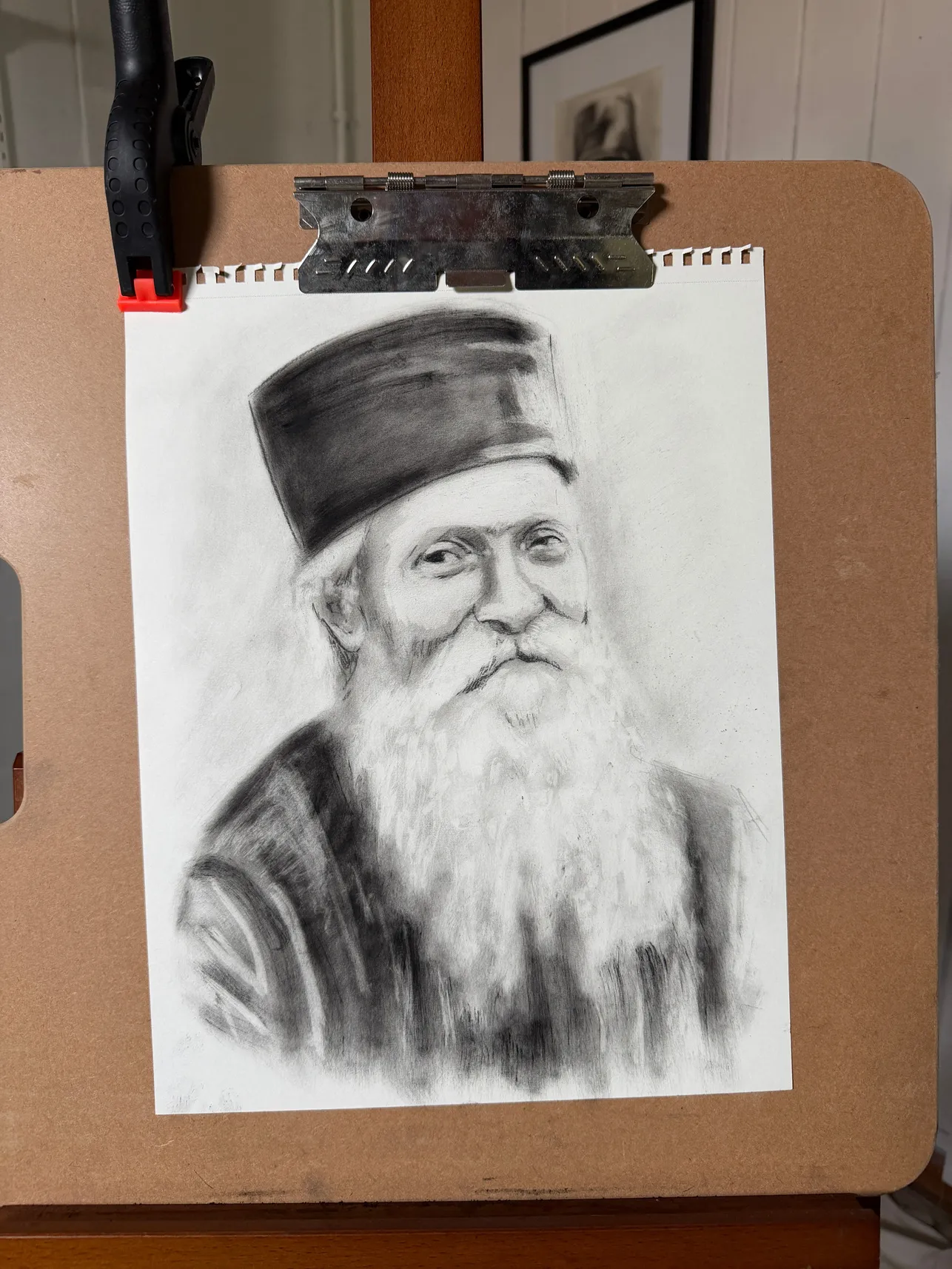 In-progress charcoal portrait of Elder Thaddeus of Vitovnica by Clare Elise Lucia.